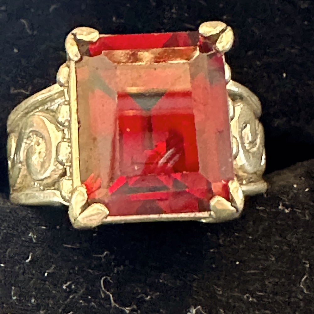 Sterling silver ring. Marked 925. Faux red stone. Size 7.